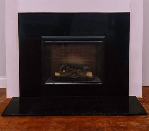Granite fireplace surround