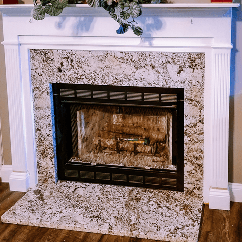 White Sands granite fireplace surround