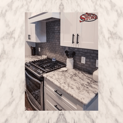 White Valley granite kitchen with cooktop cutout