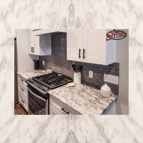 White Valley granite kitchen with cooktop cutout