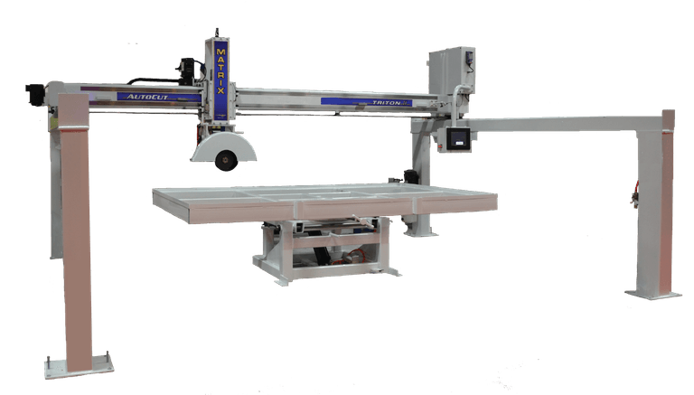 A stone slab being cut on the bridge saw in the Set In Stone fabrication shop