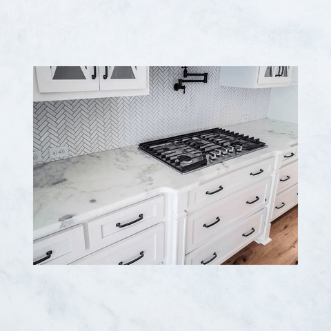 Mont Blanc quartzite kitchen with cooktop cutout